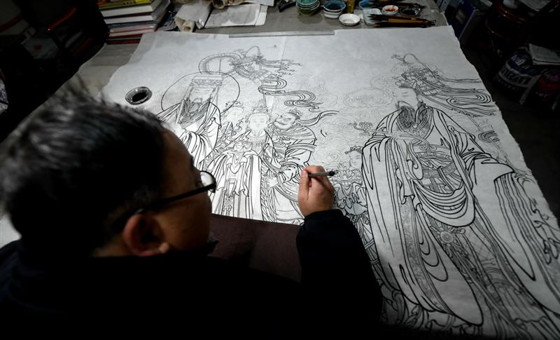 12月23日，民间画师姚淑龙在石家庄市新华区燕赵艺术市场工作室进行创作。