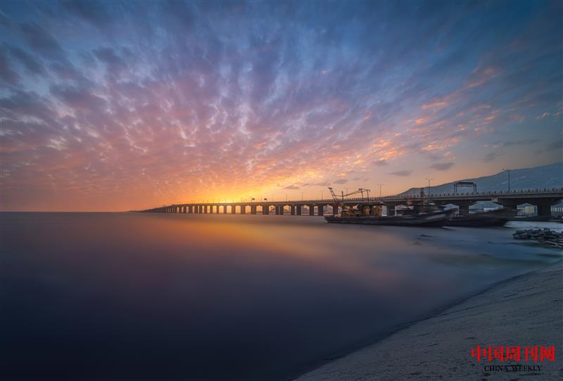 摄图网_501637289_连云港田湾大桥落日(企业商用).jpg